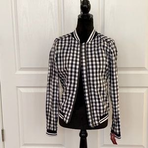 Navy and white baseball jacket.